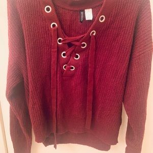 H&M, large, maroon sweater with criss cross strings in the front